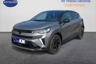 Renault Captur E-Tech hybride gris cassiopée métal avec toit noir, vue 3/4 avant droit mettant en valeur ses jantes noires.
