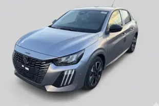 Peugeot 208 Hybrid gris vue 3/4 avant droit, avec calandre noire distinctive et jantes alliage 16 pouces.