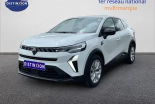 Renault Symbioz blanc nacré métal, vue 3/4 avant droit, avec calandre noire et feux LED distinctifs.