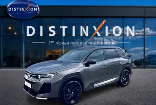 Citroën C5 Aircross gris platinium en 3/4 avant droit, avec jantes alliage noires et vitres surteintées.