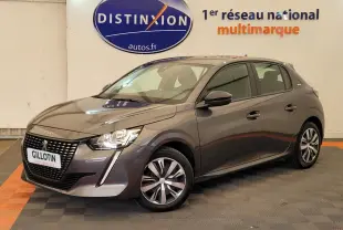 Peugeot 208 gris foncé vue 3/4 avant droit, avec calandre distinctive et jantes modernes en concession.