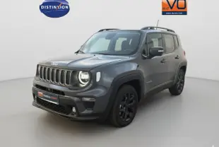 Jeep Renegade gris anthracite vue 3/4 avant droit avec barres de toit et jantes alliage noires.