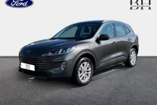 Ford Kuga hybride rechargeable gris Magnetic en vue 3/4 avant droit avec jantes alu et phares LED.