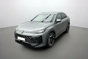 Volkswagen T-Roc ETSI 150 DSG7 R-Line gris loup, vue 3/4 avant droite sous pluie avec jantes alu noires.