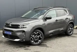 Citroën C5 Aircross gris Platinium en 3/4 avant droit, avec toit bi-ton noir et jantes alliage 18'' bi-ton.