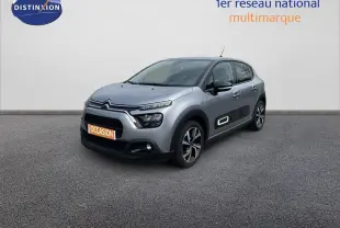 Citroën C3 gris Artense métal vue 3/4 avant droit avec ses protections latérales noires et jantes bi-ton.