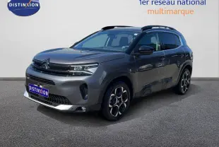 Citroën C5 Aircross gris platinium métal en 3/4 avant droit, SUV hybride essence avec jantes bi-ton distinctives.