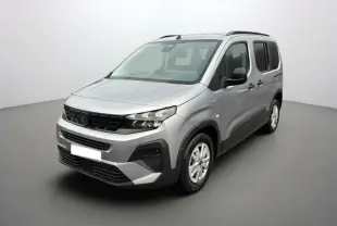 Peugeot Rifter BlueHDi 130 gris Artense en 3/4 avant droit avec barres de toit et vitres surteintées.