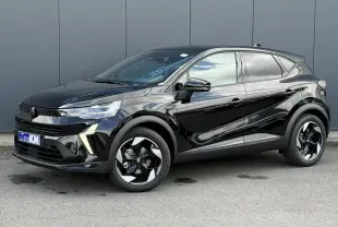 Vue 3/4 avant droite du Renault Captur 2026 noir étoilé avec jantes aluminium 18 pouces et vitres surteintées.