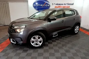 Citroën C5 Aircross gris foncé vue 3/4 avant droit, jantes alliage 17 pouces et inserts Silver Anodisé visibles.