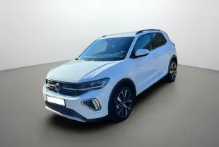 Volkswagen T-Cross TSI 116 DSG7 R-Line blanc pur en 3/4 avant droit avec jantes alu 18 pouces et barres de toit.
