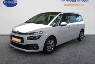 Citroën Grand C4 Picasso blanc vu en 3/4 avant droit avec phares LED et jantes alliage 16 pouces.